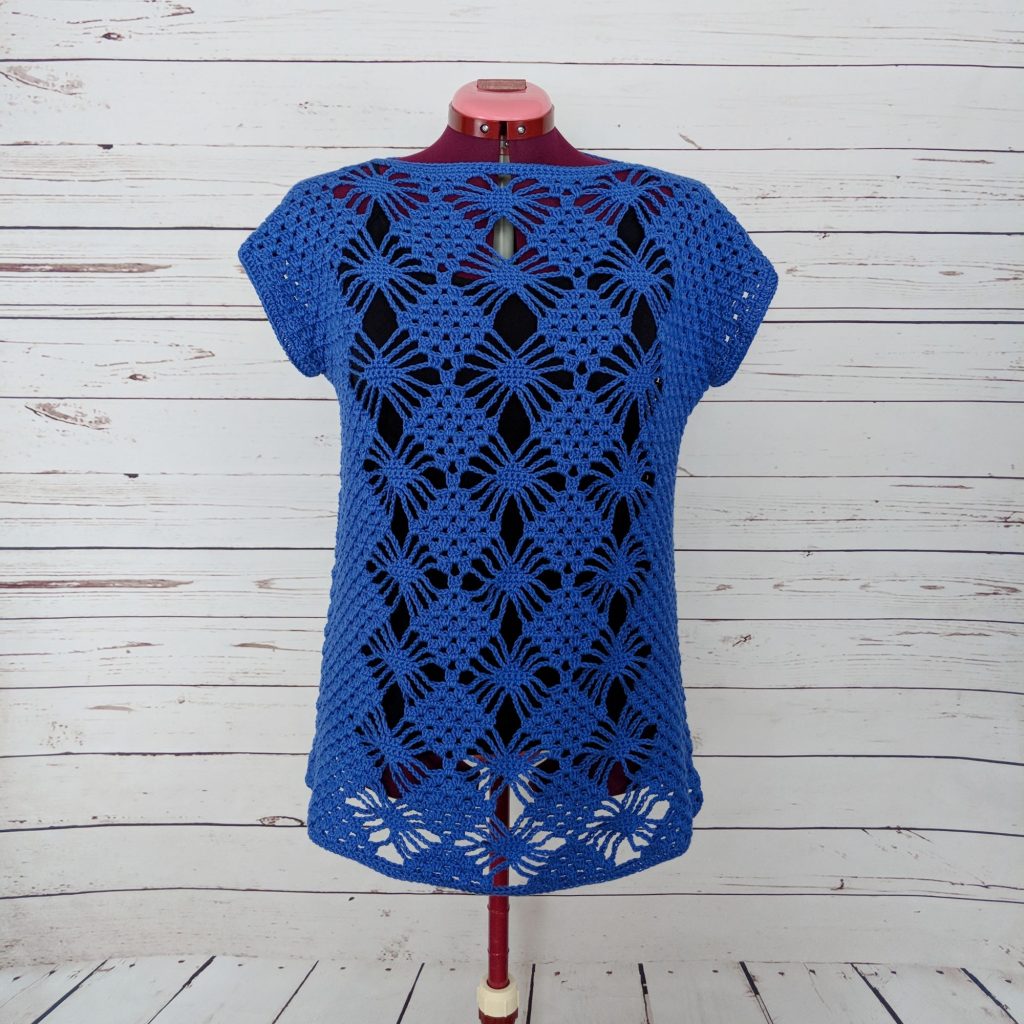 Stylized photo of Free Crochet Top Pattern - Chasing Diamonds Tunic.