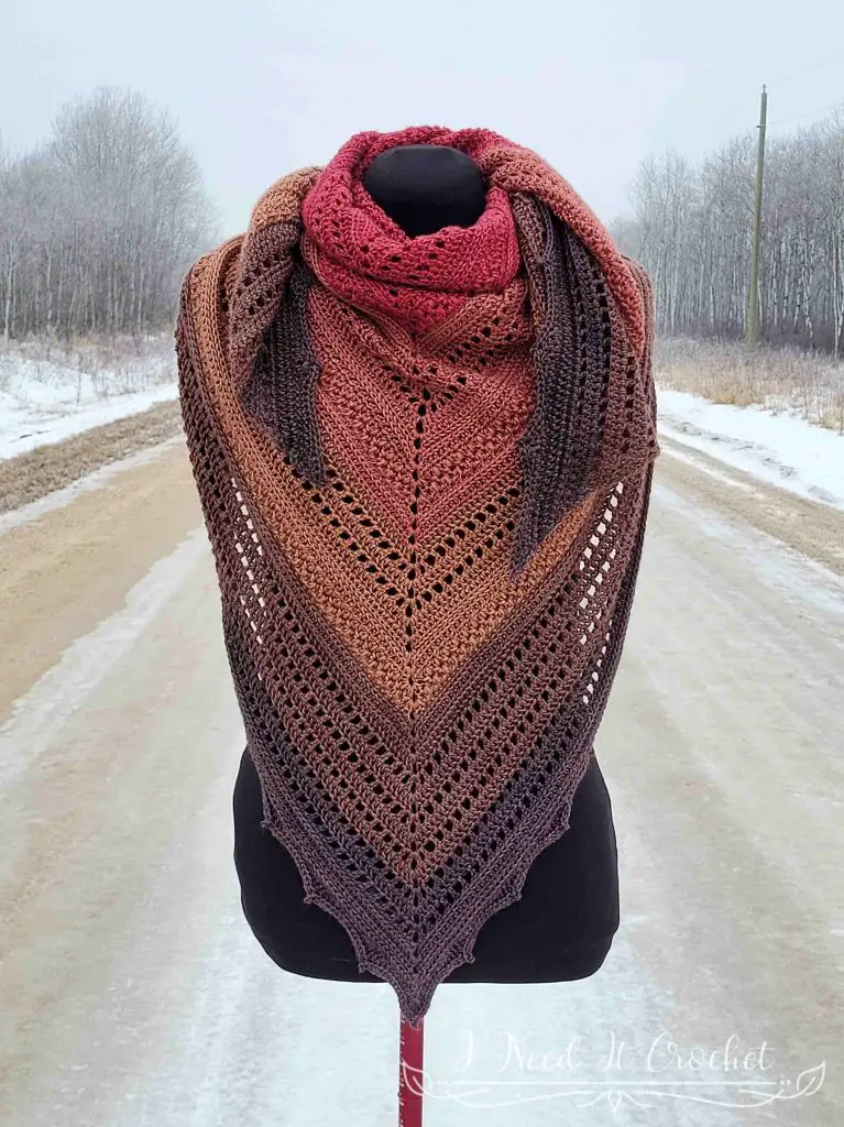 Stylized photo of the Free Crochet Shawl Pattern - Pinnacle Shawl.