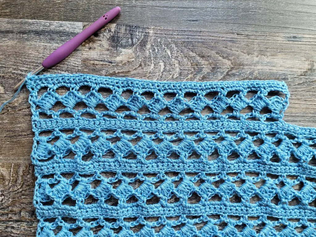 Figure 3 showing the back lace panel and beginning of left shoulder.