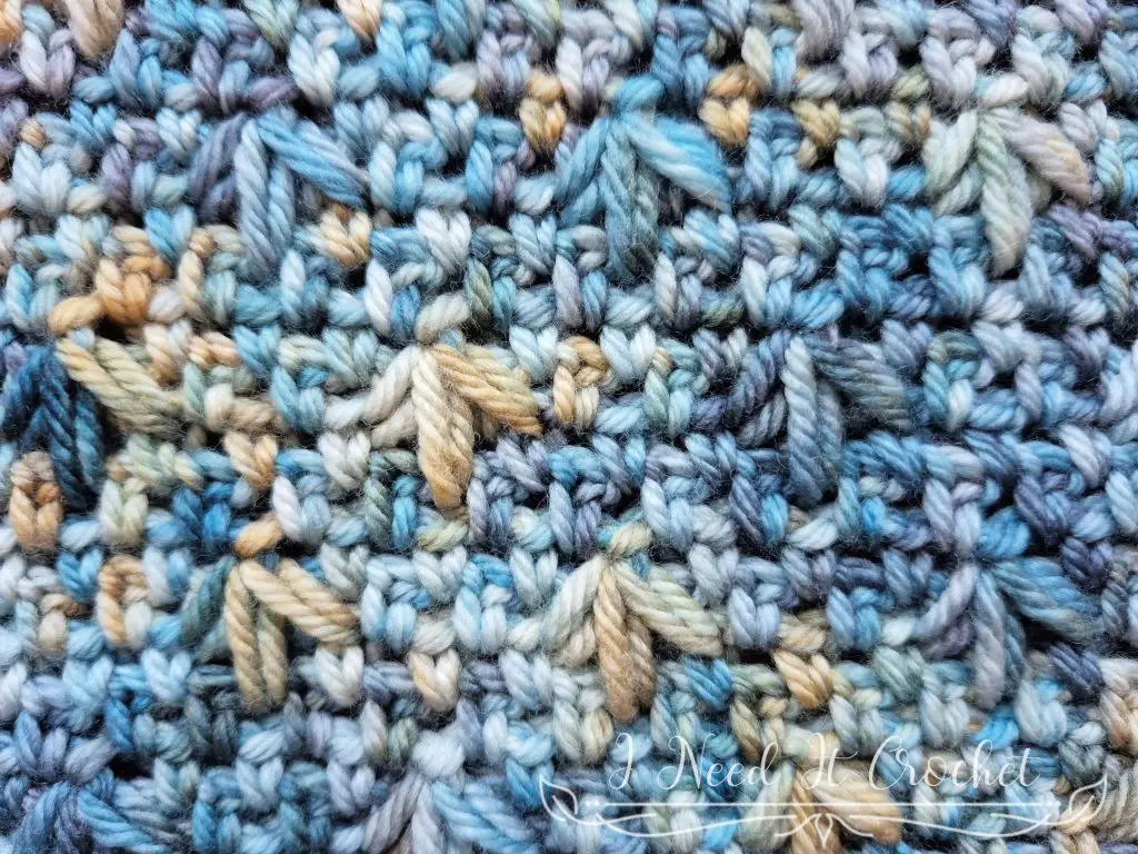 Crochet fabric featuring the birdsfoot stitch texture